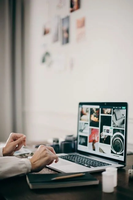 A clean and modern workspace featuring a laptop, tablet, smartphone, and monitor. Ideal for remote work and tech setups.